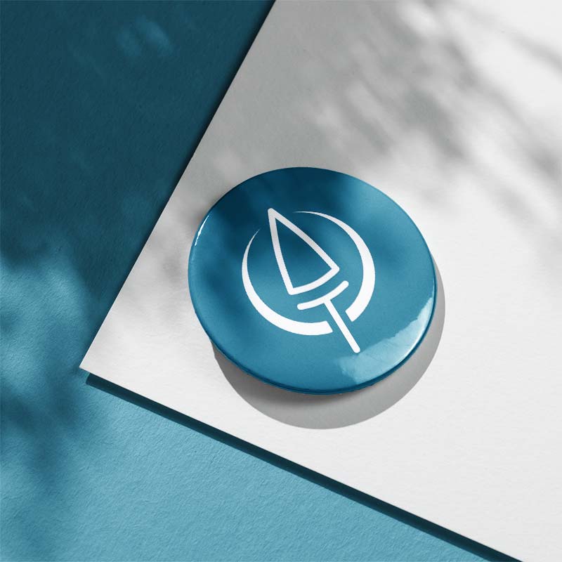 Badge rond personnalisé pour l'Atelier du Teck